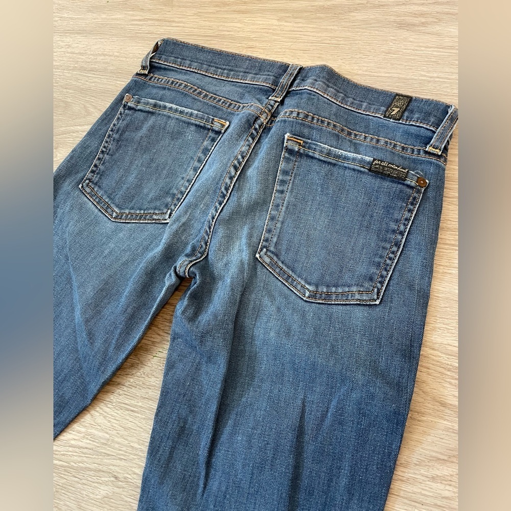 7 for all Mankind - “The Skinny” blue jeans. Size 26